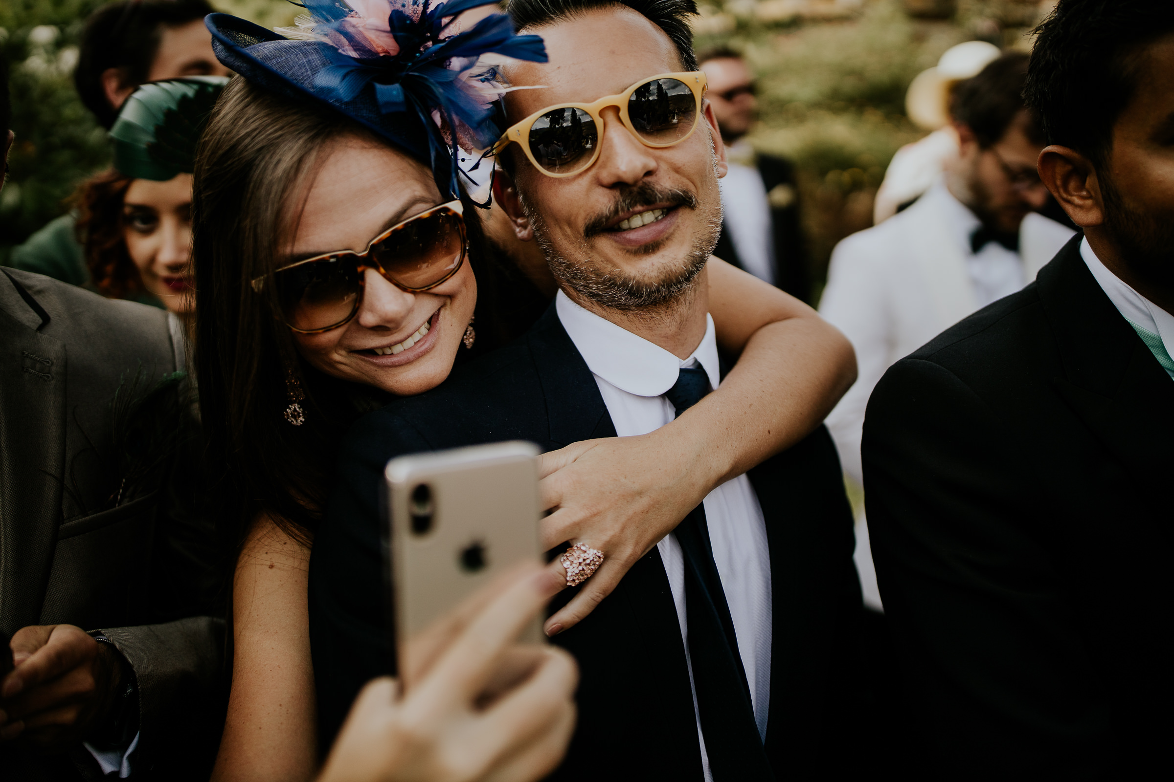 wedding guests taking selfie