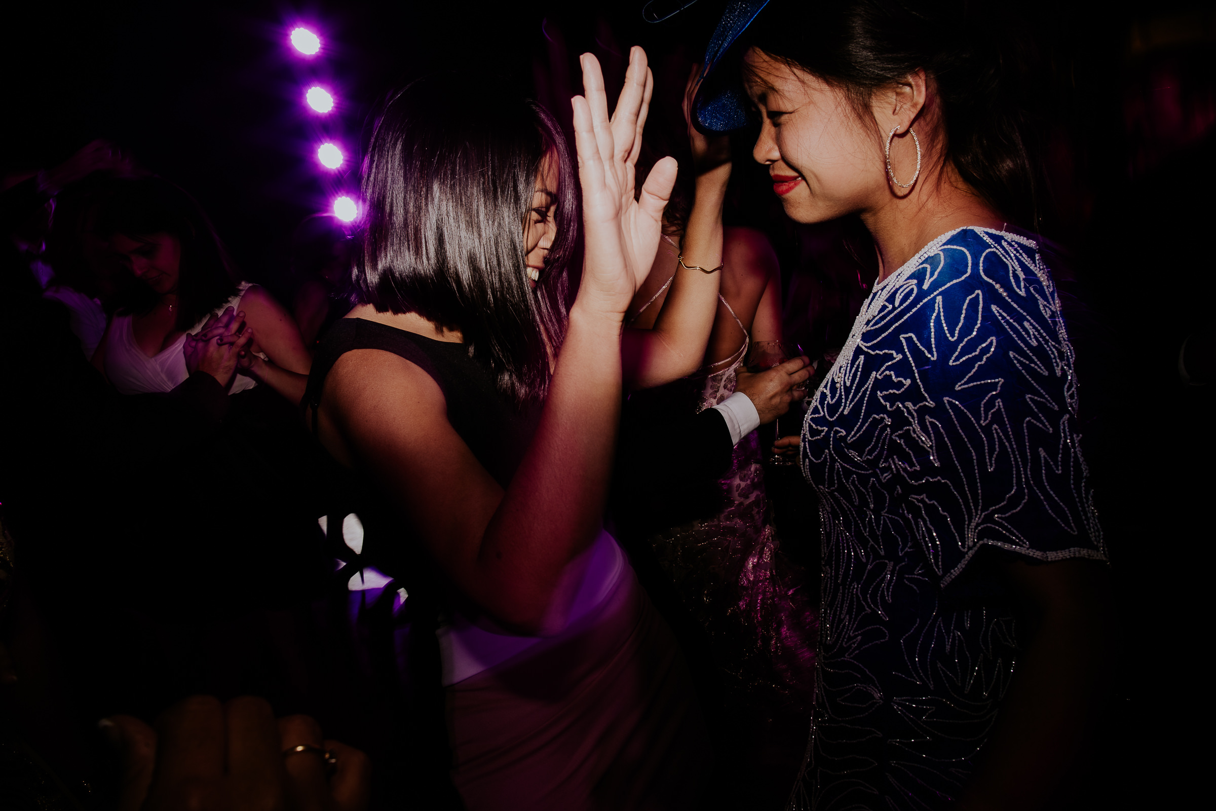 two women dancing at a wedding party